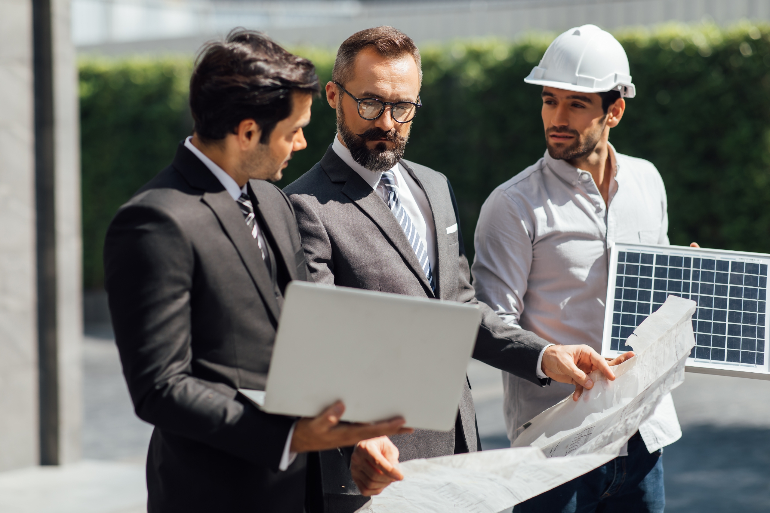 Hipster,Business,Man,And,Office,Building,Owner,And,Energy,Engineer